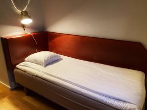 Postel nebo postele na pokoji v ubytování Hotel Örgryte
