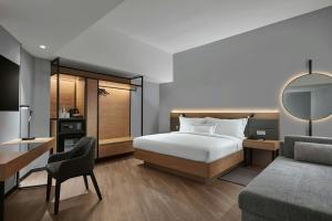 Postel nebo postele na pokoji v ubytování AC Hotel by Marriott Ipoh
