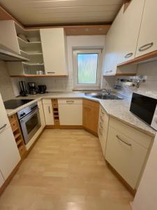 Kuchyň nebo kuchyňský kout v ubytování Charmantes Apartment in Ansbach
