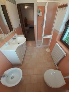 Koupelna v ubytování Parco Gessilandia