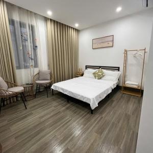 Postel nebo postele na pokoji v ubytování Hôm - Homestay TD306 Ocean Park 3, near Wave Park, Venice