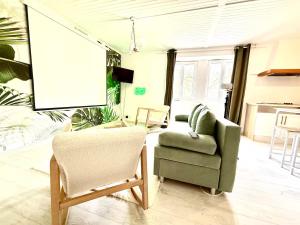 Posezení v ubytování Balneo & Ciné - Jungle Touch - Direct Genève - Gare Bellegarde