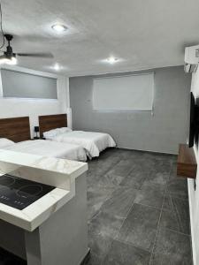Postel nebo postele na pokoji v ubytování Apartamentos 31
