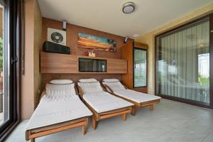 TV a/nebo společenská místnost v ubytování DIVINUS HOLIDAY HOUSE