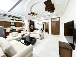 Kuchyň nebo kuchyňský kout v ubytování Luxury Apartment Guest House