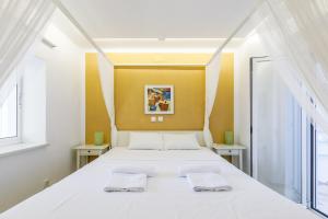 Postel nebo postele na pokoji v ubytování A&N Caleta de Velez Beach