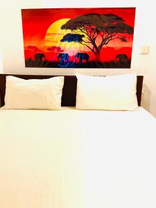 Postel nebo postele na pokoji v ubytování Marina Way Hotel