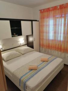 Ένα ή περισσότερα κρεβάτια σε δωμάτιο στο Holiday Home Terra
