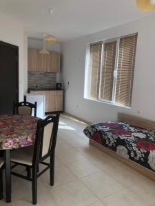 Η κουζίνα ή μικρή κουζίνα στο Dobi Apartments