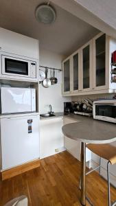 Η κουζίνα ή μικρή κουζίνα στο Studio in Reikjavik heart +3 φωτογραφίες