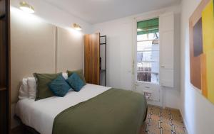 Postel nebo postele na pokoji v ubytování Stay U-nique Apartments Floridablanca