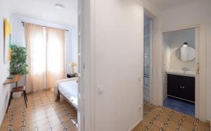 Postel nebo postele na pokoji v ubytování Stay U-nique Apartments Floridablanca