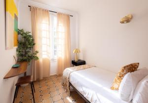 Postel nebo postele na pokoji v ubytování Stay U-nique Apartments Floridablanca