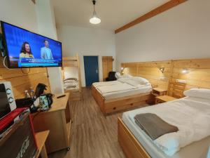 Postel nebo postele na pokoji v ubytování Max Motel