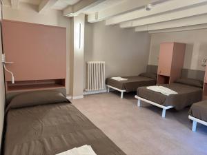 Postel nebo postele na pokoji v ubytování Protezione della Giovane - female hostel