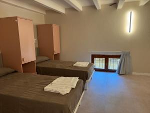 Postel nebo postele na pokoji v ubytování Protezione della Giovane - female hostel