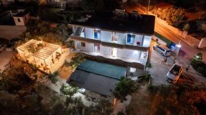an overhead view of a house with a swimming pool at Vila Eden in Ksamil