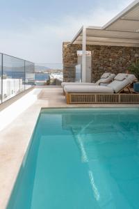 Bazén v ubytování Νumi Boutique Hotel nebo v jeho okolí + 37 fotografií