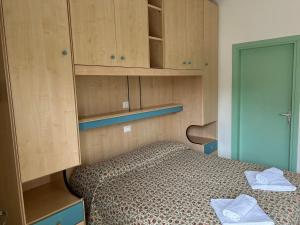 Postel nebo postele na pokoji v ubytování Hotel Mirage
