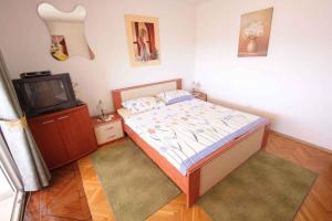 Postel nebo postele na pokoji v ubytování One-Bedroom Apartment in Crikvenica 27