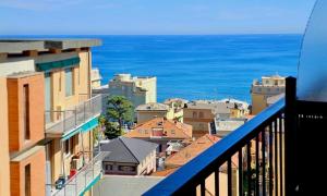a view of a city from a balcony at Bilocale Italia con vista mare in Varazze