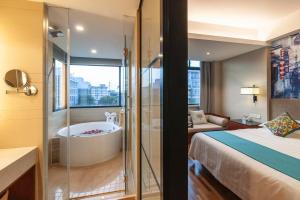 Luoxingge SSAW Boutiquel Hotel客房内的一张或多张床位
