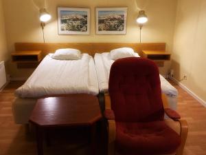 Postel nebo postele na pokoji v ubytování Hotel Örgryte
