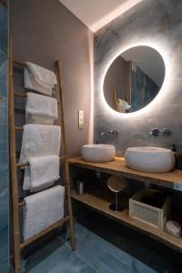 a bathroom with two sinks and a mirror at Apartment 2 Bedrooms & Terrace - Fully Air-Conditioned - King Size Beds in Sélestat