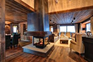 Χώρος καθιστικού στο Chalet Alta