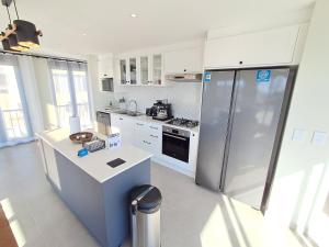 Η κουζίνα ή μικρή κουζίνα στο Seaview Luxury loft apartment +7 φωτογραφίες