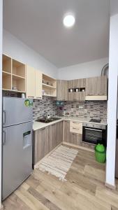 Kuchyň nebo kuchyňský kout v ubytování Vala Mar Apartments by Four C