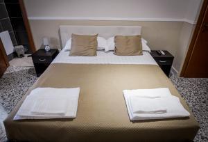 Postel nebo postele na pokoji v ubytování B&B Garibaldi