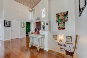 a living room with a table and butterflies on the wall at The Grateful Den - Cozy retreat in Big Canoe in Jasper +46 photos