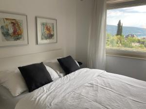 Ένα ή περισσότερα κρεβάτια σε δωμάτιο στο Efeunest - Stilvolles Apartment mit Balkon