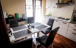 Kuchyň nebo kuchyňský kout v ubytování B&B Garibaldi + 19 fotografií