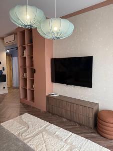 Et tv og/eller underholdning på Apartamenty FalamiLas