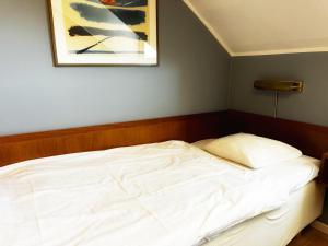 Postel nebo postele na pokoji v ubytování Hotel Örgryte
