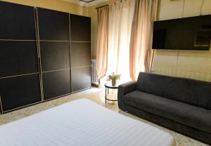 Postel nebo postele na pokoji v ubytování B&B Garibaldi