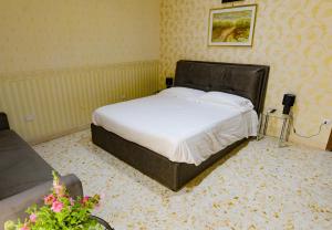 Postel nebo postele na pokoji v ubytování B&B Garibaldi