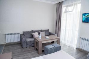Posezení v ubytování Max Hotel