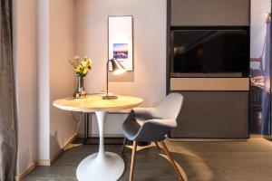 Μια τηλεόραση ή/και κέντρο ψυχαγωγίας στο Atour Hotel Xiamen Jimei Lake Business Center