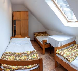 Postel nebo postele na pokoji v ubytování Dom Gościnny