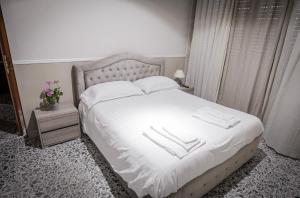 Postel nebo postele na pokoji v ubytování B&B Garibaldi