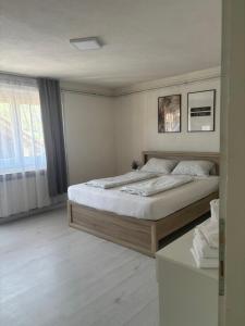 Ένα ή περισσότερα κρεβάτια σε δωμάτιο στο Lavanda house +9 φωτογραφίες