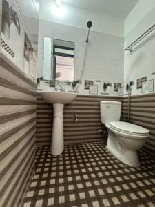 Koupelna v ubytování Tiến Minh Hotel cầu Pắc Ta