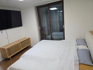 Postel nebo postele na pokoji v ubytování Healing time
