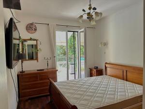 Posteľ alebo postele v izbe v ubytovaní VILLA avec piscine WIFI parking (Villeneuve Loubet)
