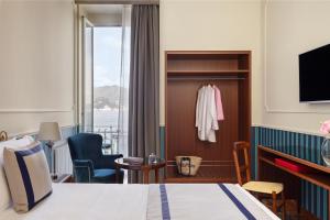 Кровать или кровати в номере Grand Hotel Miramare