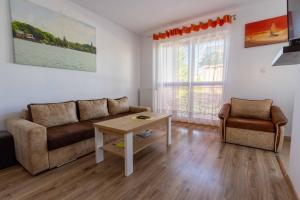 Posezení v ubytování Apartamenty 3 kolory + 8 fotografií