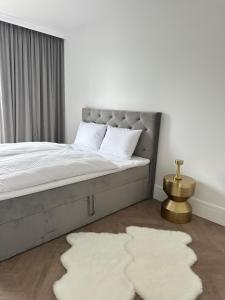 Ένα ή περισσότερα κρεβάτια σε δωμάτιο στο Apartament z Widokiem Centrum HGS Home
